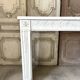 Louis XVI fireplace in white marble, 19th century.
