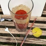 Vintage 80s cocktail lamp in colored glass with a straw and a slice