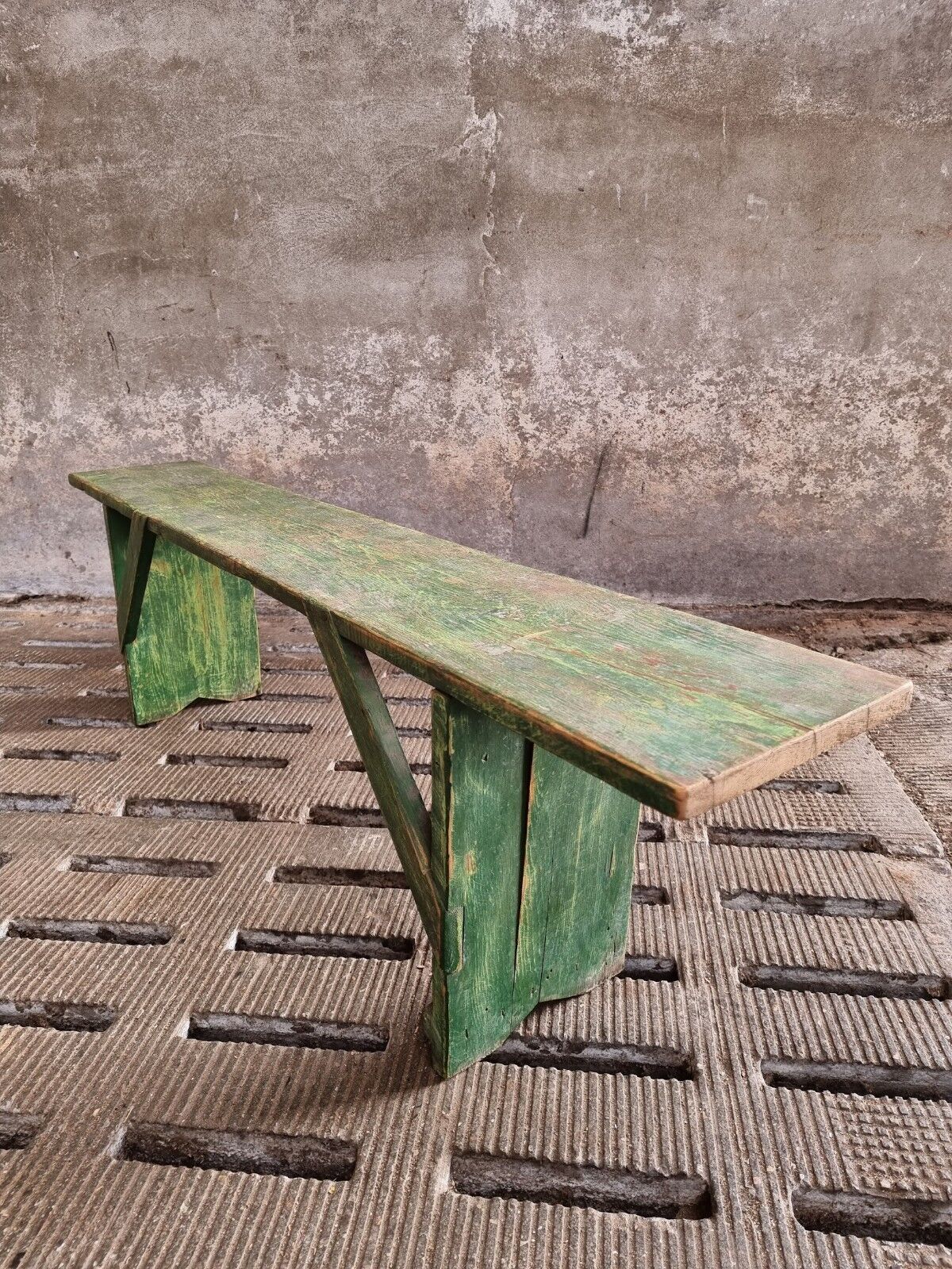 Old wooden bench side table grass green