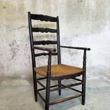 High back straw armchair