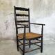 High back straw armchair