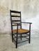 High back straw armchair