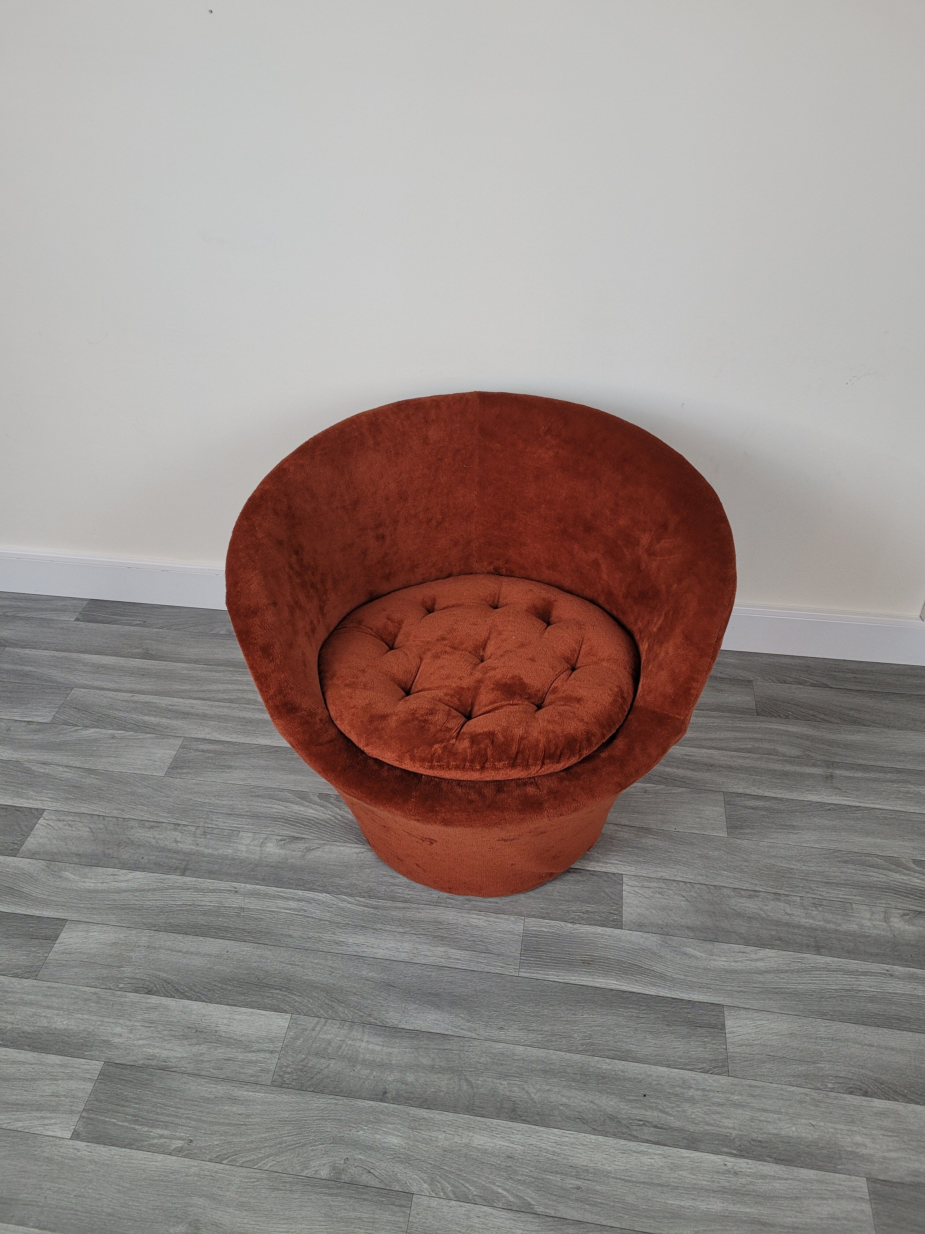Orange velvet armchair