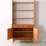 Vintage bookcase with storage compartment