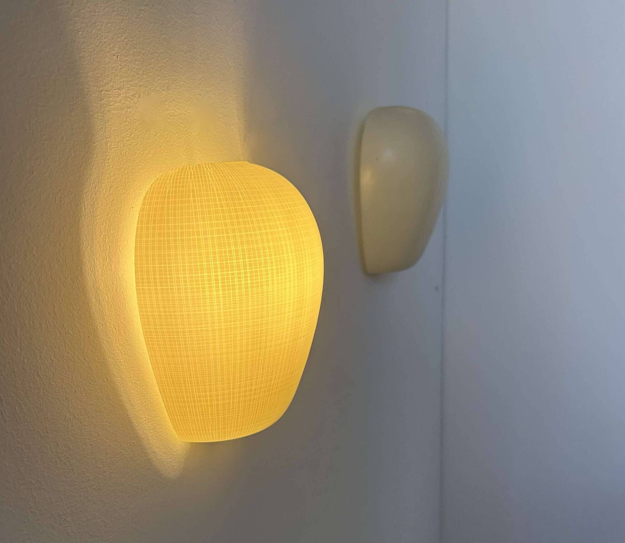 Pair of vintage wall lights, striated opaline white glass, France 1950