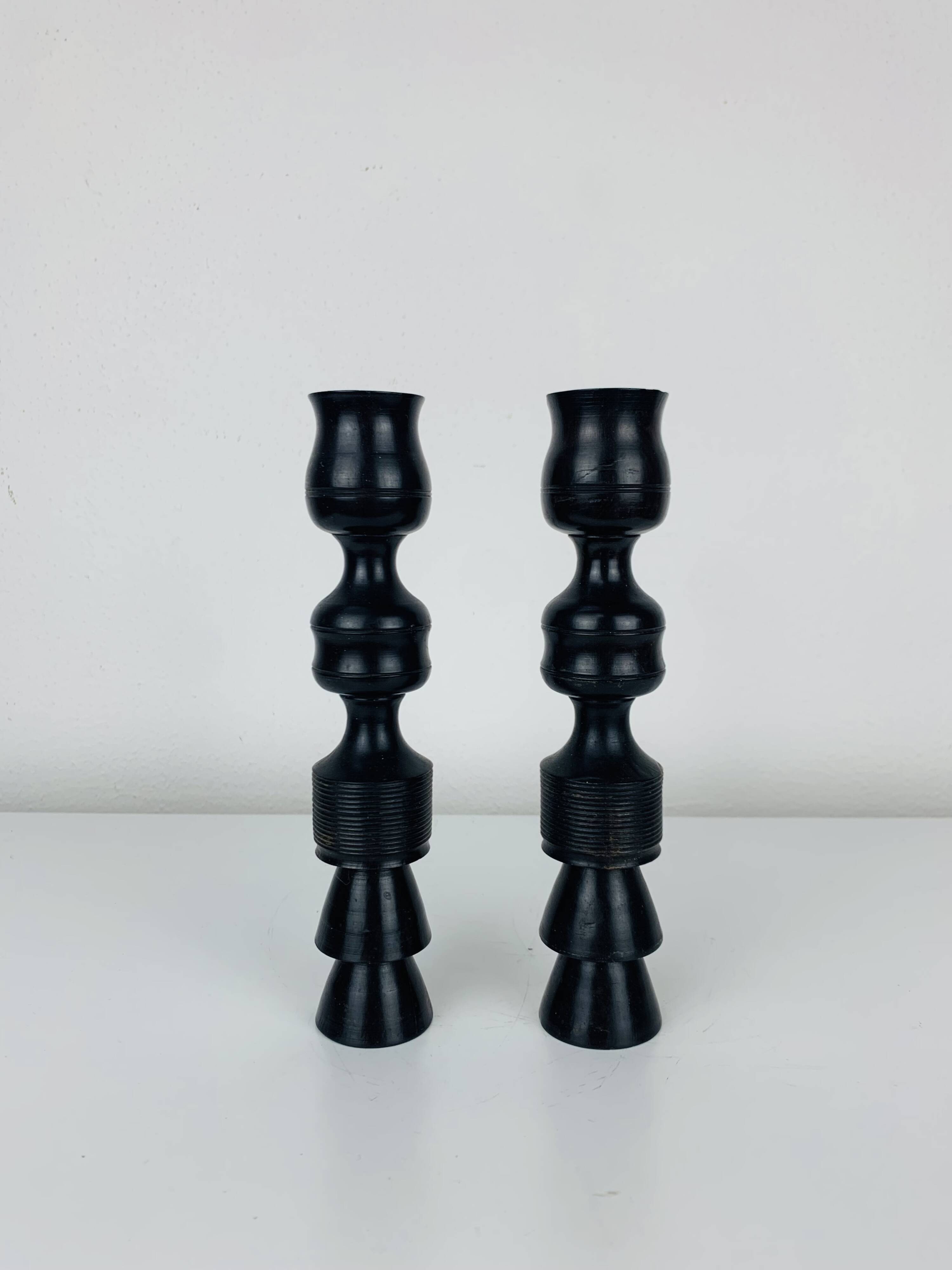 Pair of vintage ethnic blackened wood candlesticks