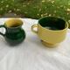 Enameled ceramic bowl and milk jug, two-tone yellow and green, vintage 1950