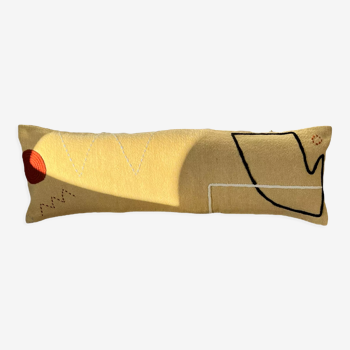 Yellow bolster cushion