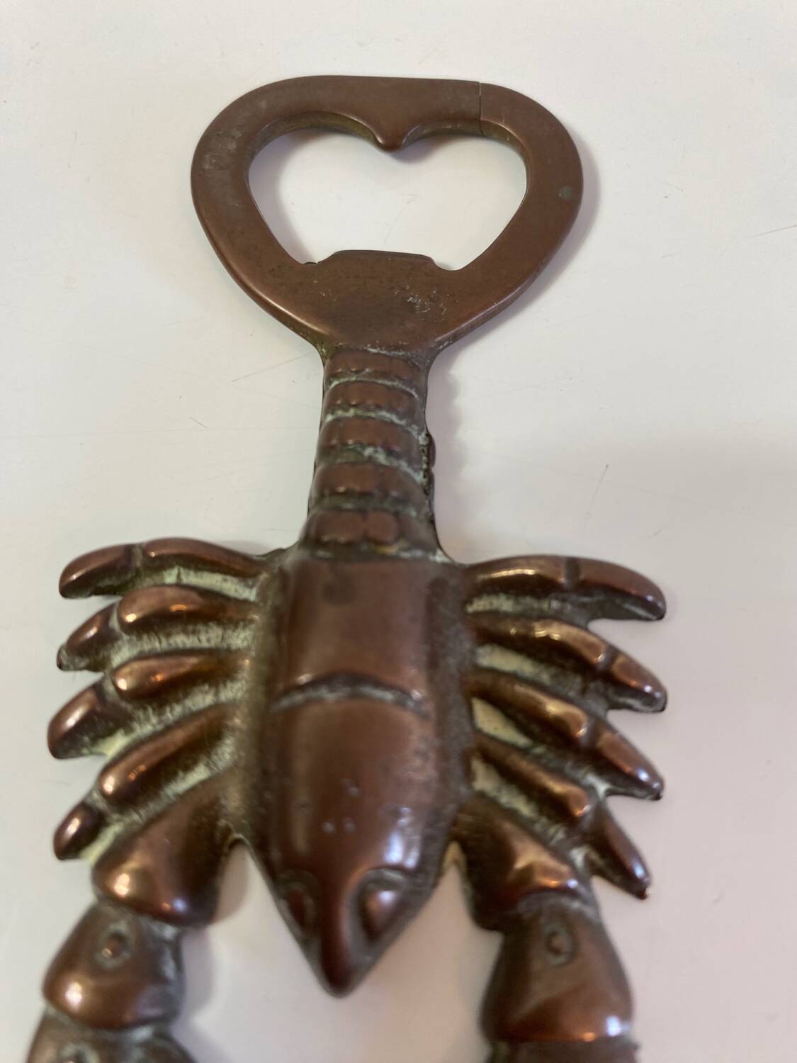Brass lobster bottle opener