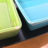 Black metal appetizer set with colorful ceramic ramekins