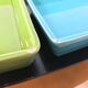Black metal appetizer set with colorful ceramic ramekins