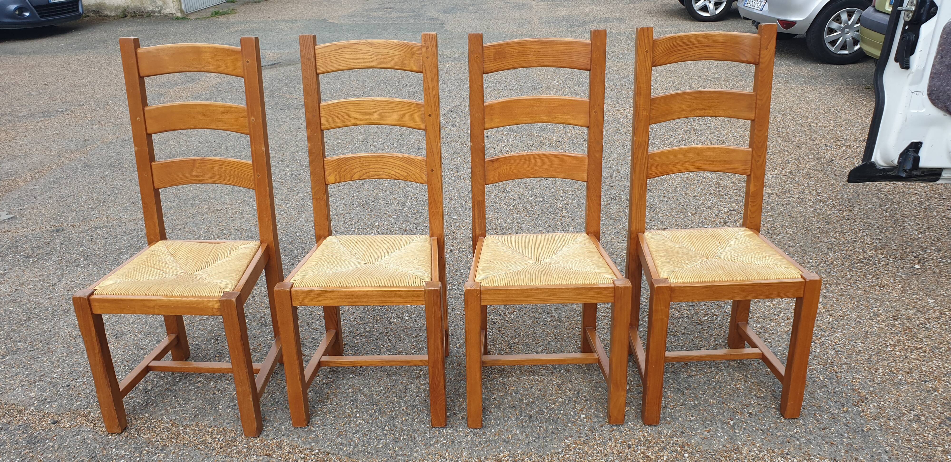 4 solid oak straw chairs