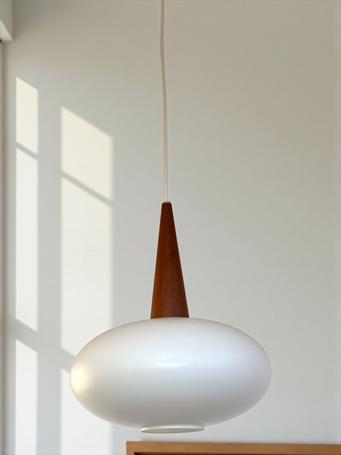 Vintage suspension light in opaline by Louis Kalff for Philips from 1968.