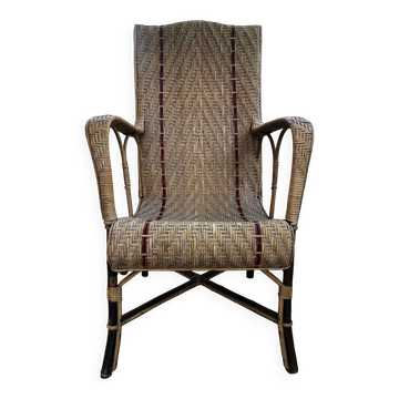 Vintage wicker rattan armchair from the 50s and 60s.