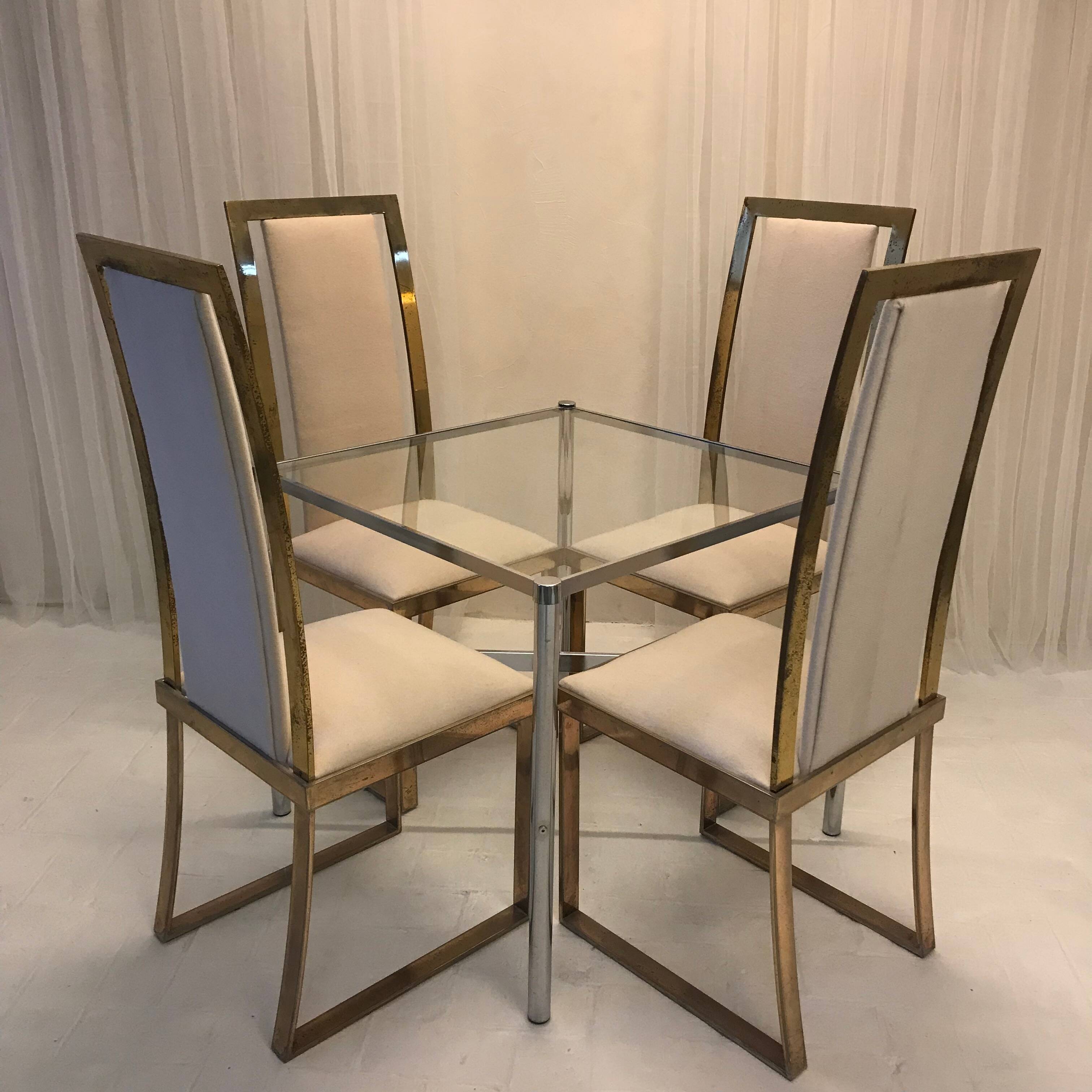 Set of 2 Michel Mangematin chairs in brass and virgin wool.