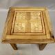 Coffee table on old parquet floor with marquetry