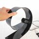 Lampe looping en acier, Massive, Belgique, 1990.