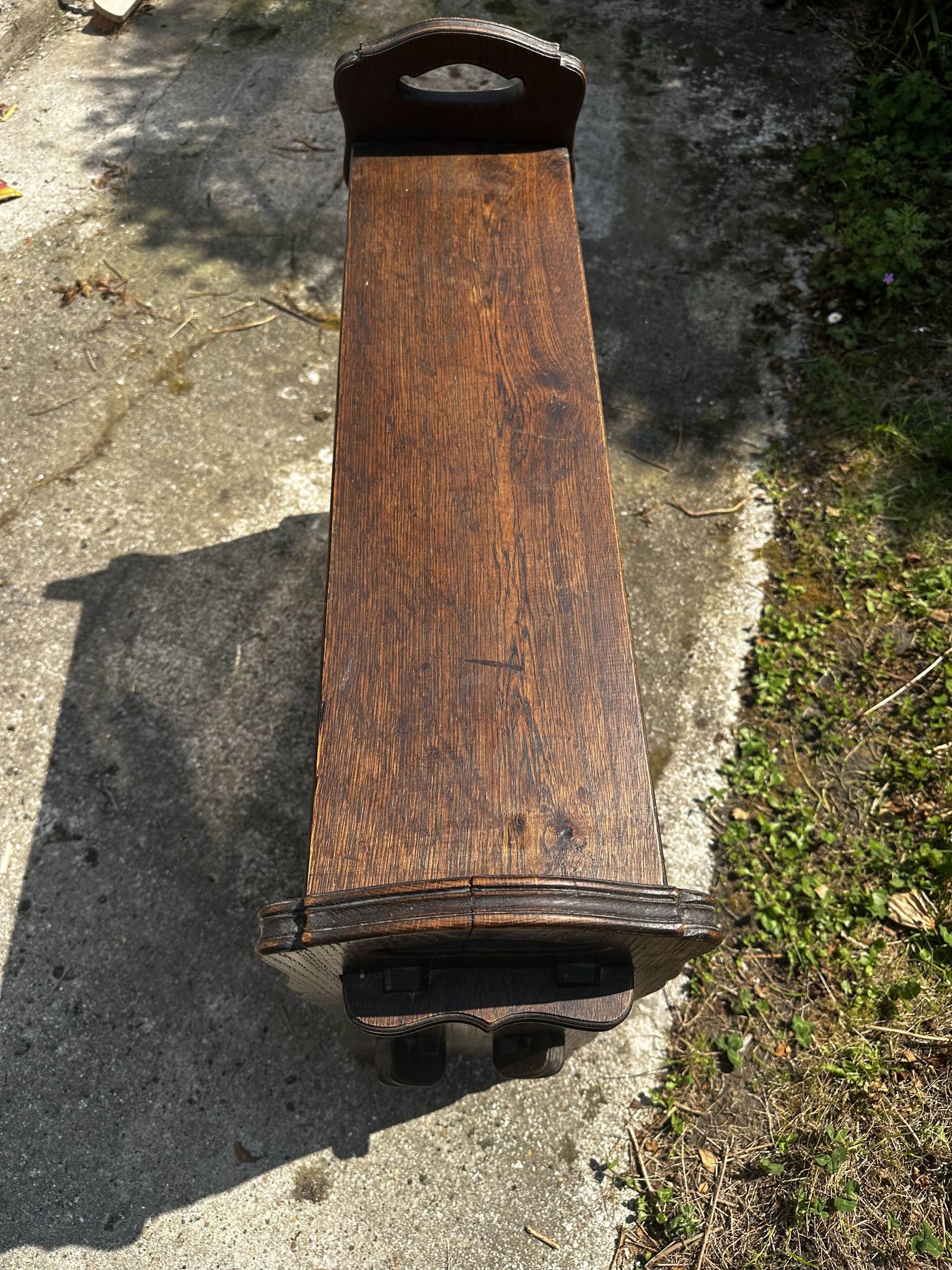 Small magazine rack / accent furniture in dark oak, late 19th century.