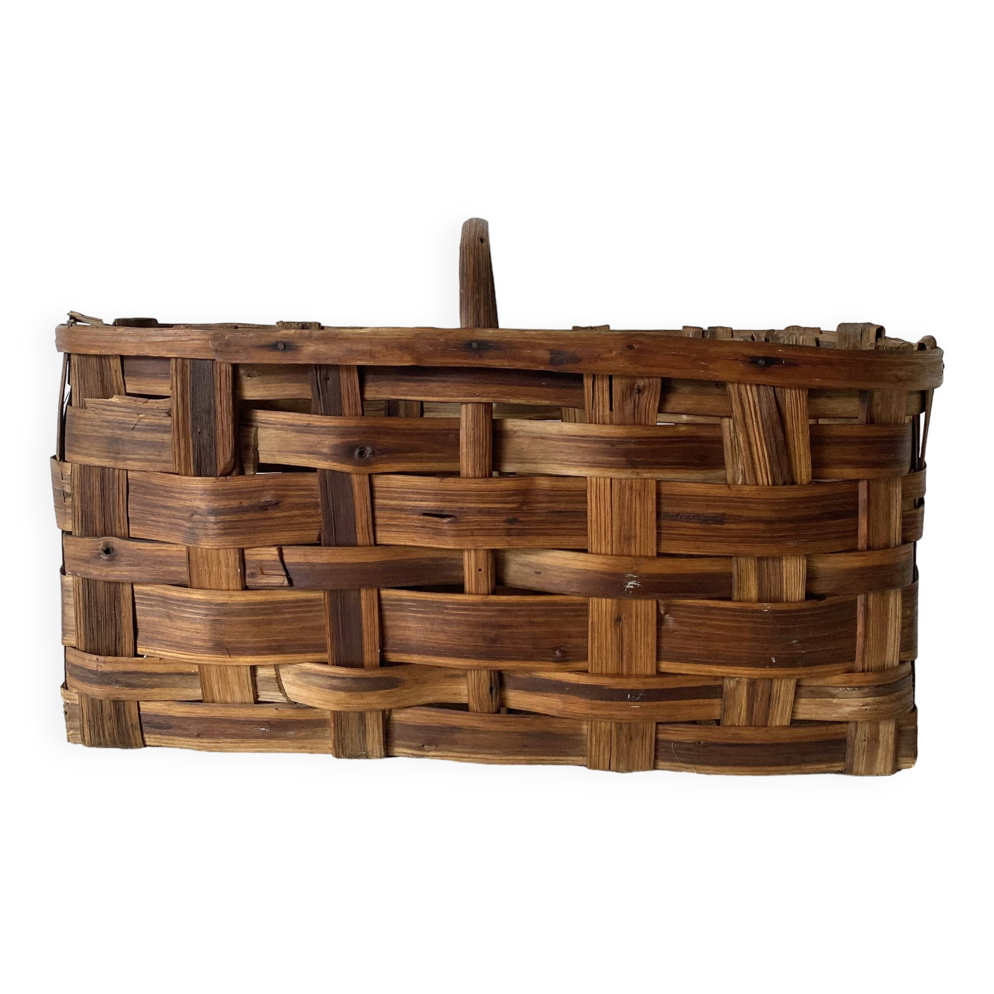 Old basket in woven chestnut wood