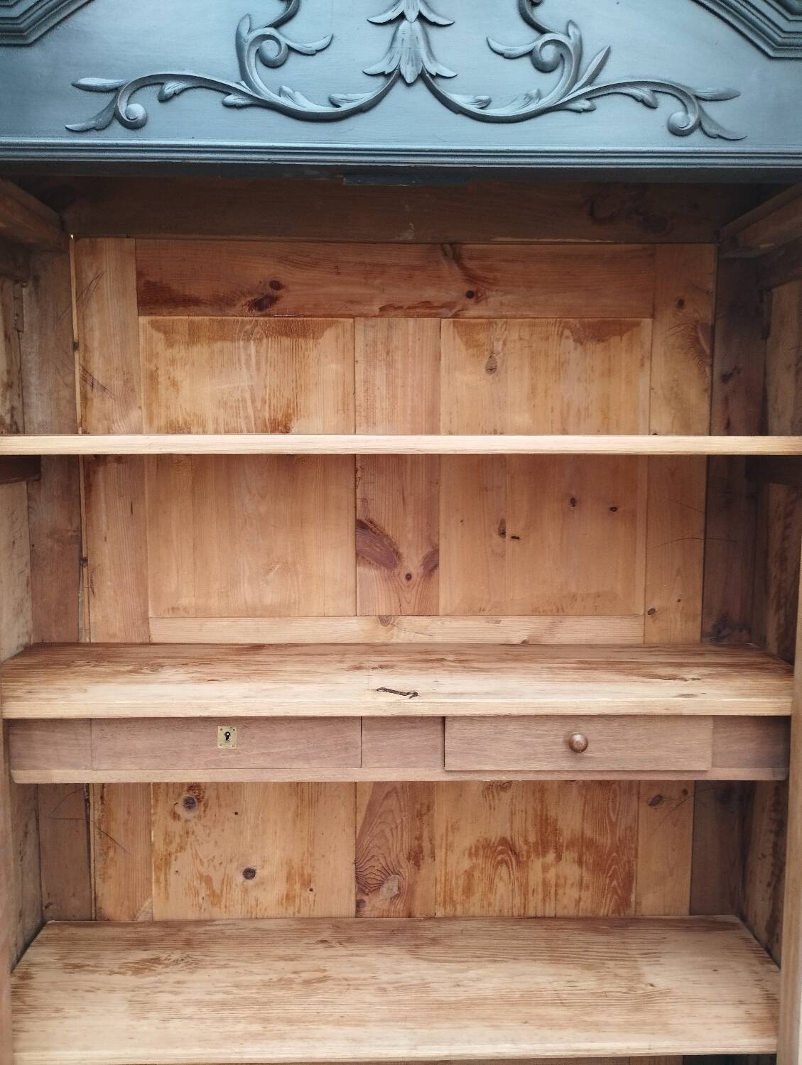 Bookcase black patina shell pediment 2 drawer doors