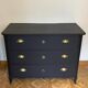 Commode classique noir mat et laiton