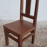 Old children's chair in solid teak
