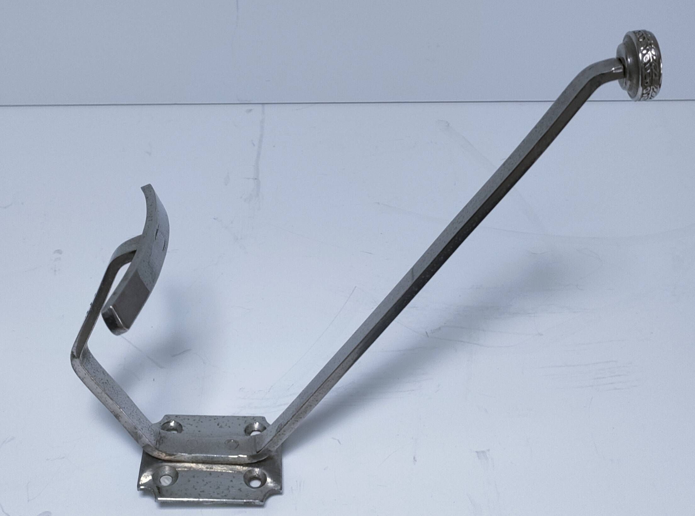 Three brass, chrome, aluminum hooks, early 20th century