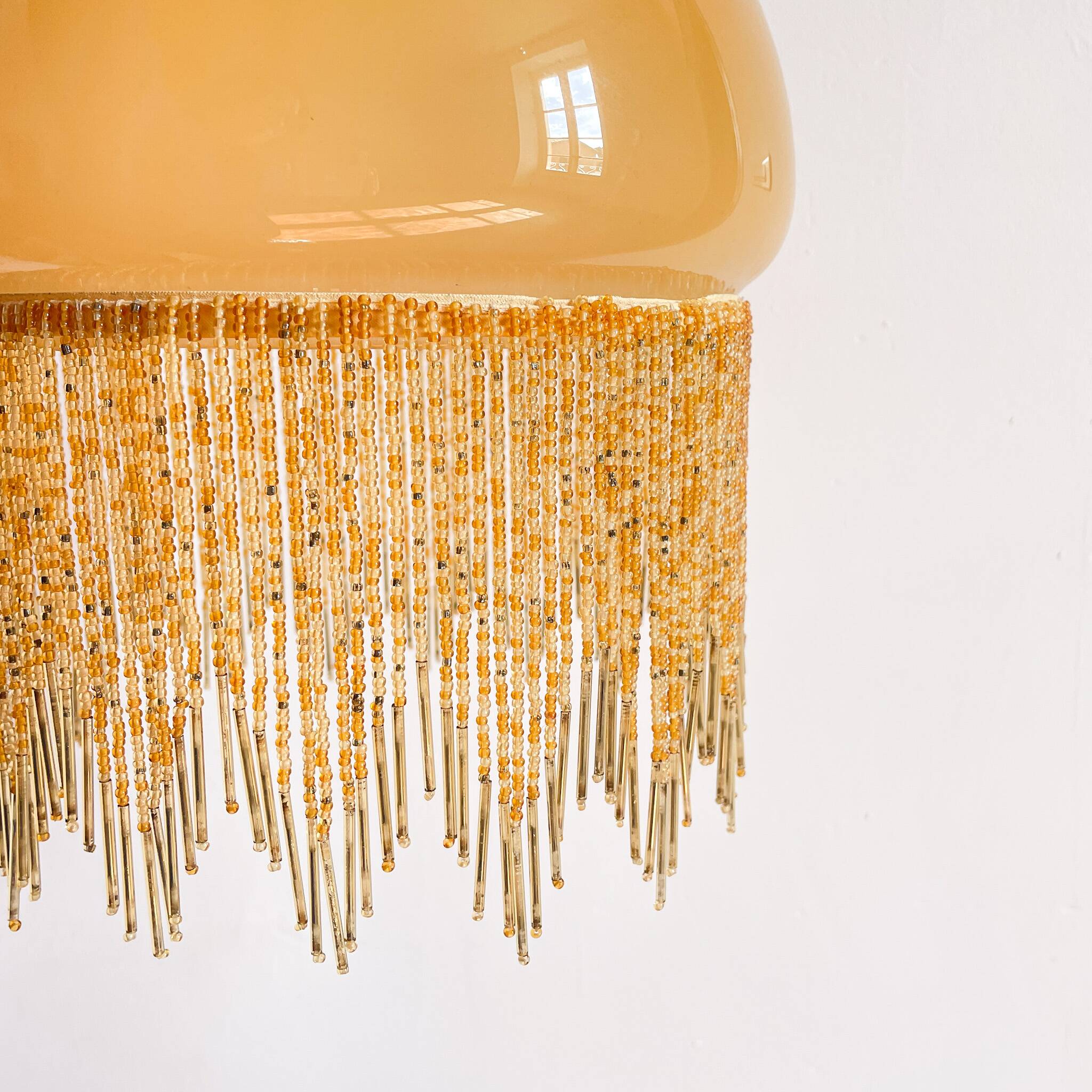 Fringed opaline pendant light