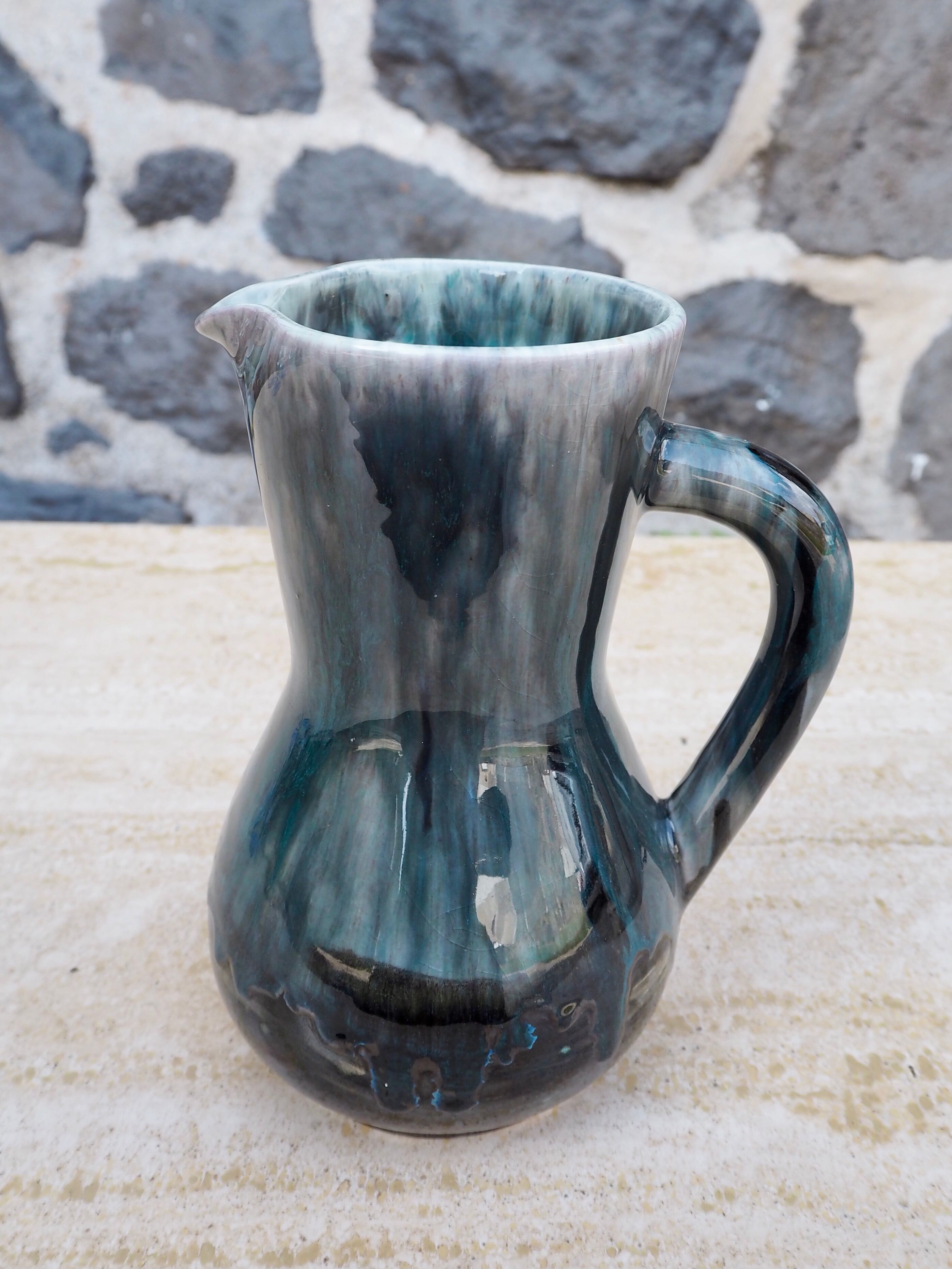 Enamelled ceramic pitcher signed Morvan