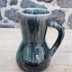 Enamelled ceramic pitcher signed Morvan