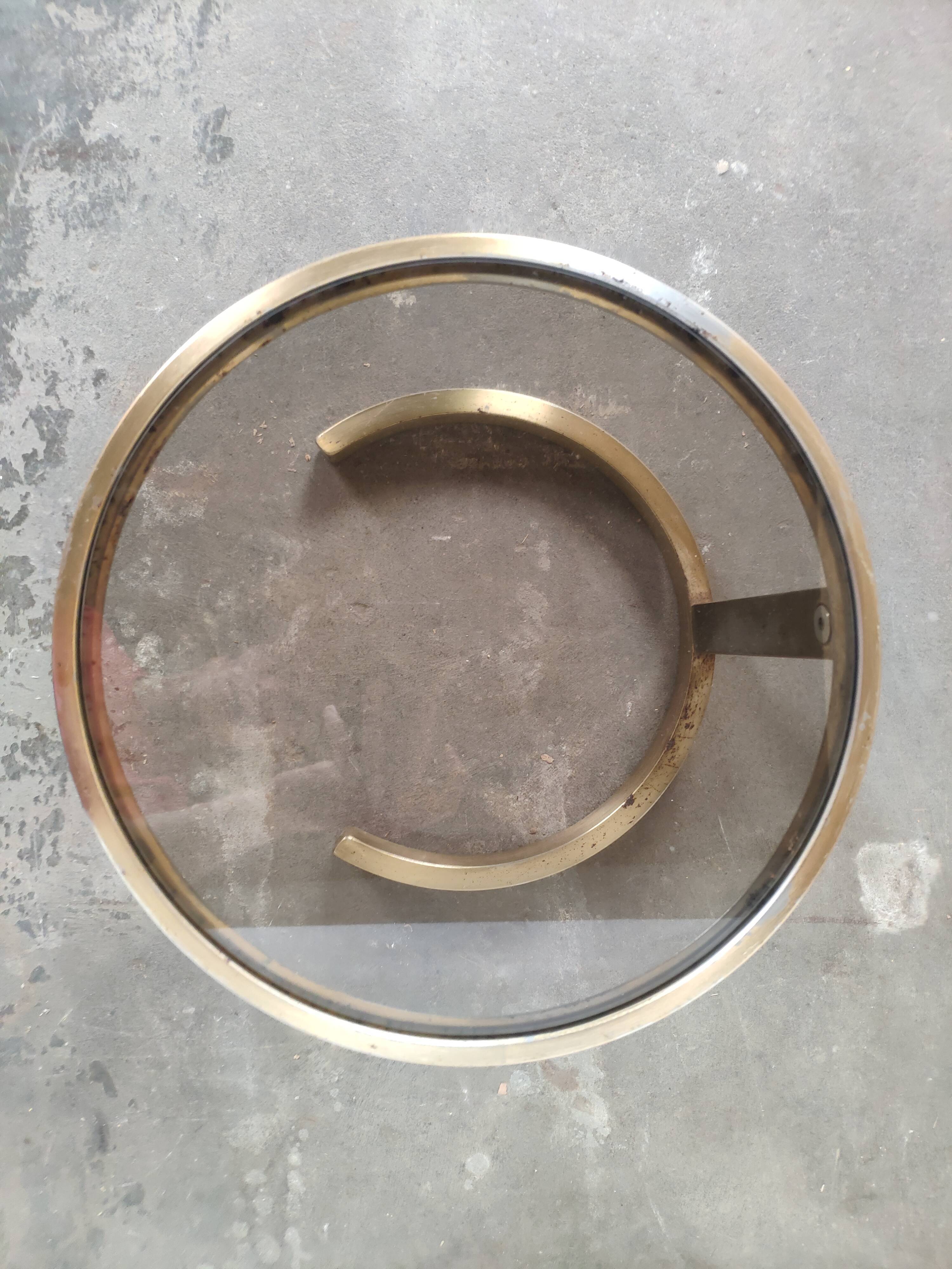 Superb trundle table round golden and smoked glass