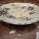 Ceramic plate signed by Marie-Madeleine Jolly – thistle decoration – year