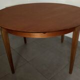 Scandinavian round teak dining table from the 60s extendable