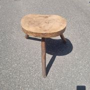 Old wooden tripod stool