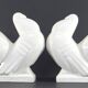 Manufacture de saint-clément, 1930s, pair of bookends figuring pigeons.