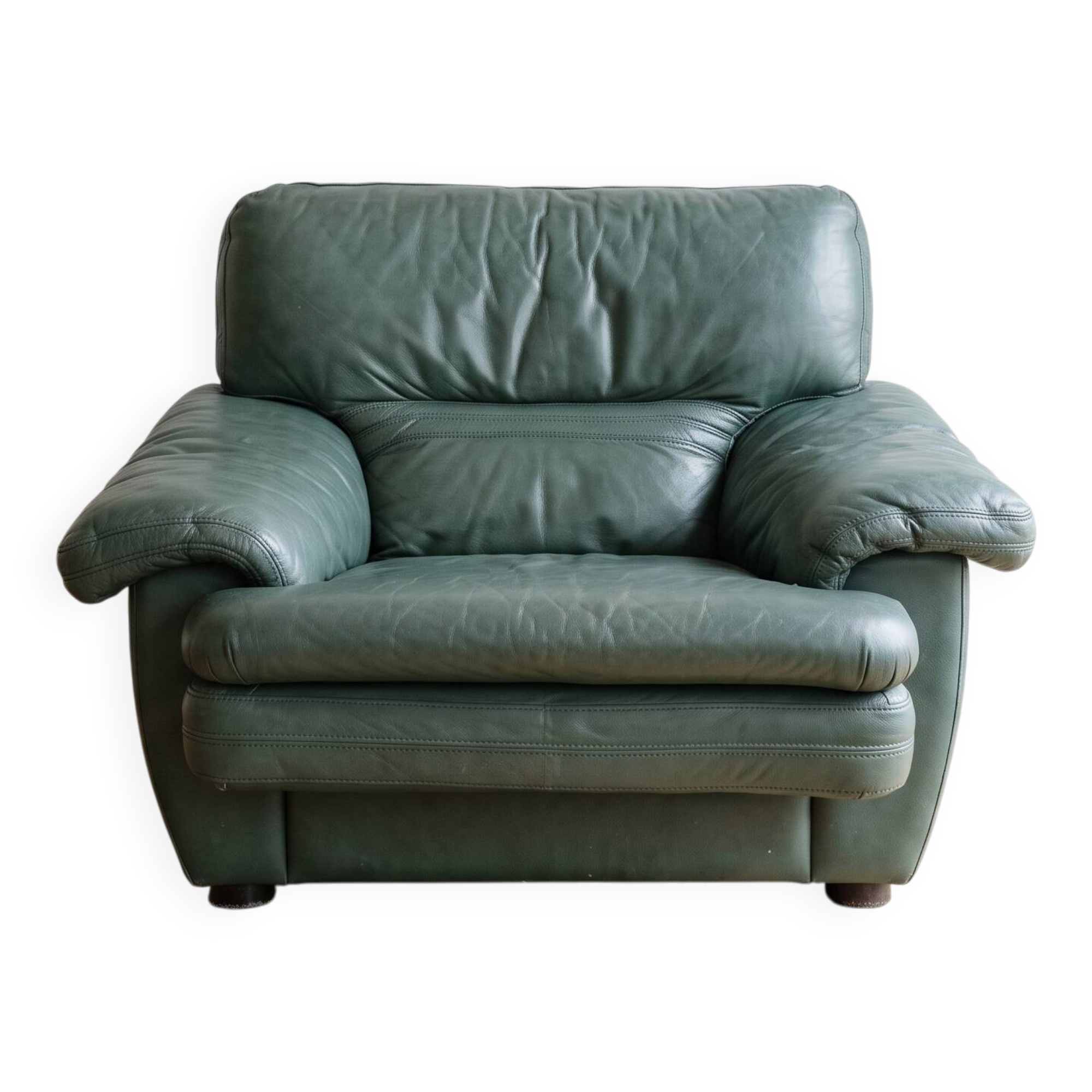 Vintage green leather armchair