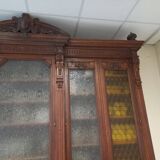Glass-fronted walnut bookcase