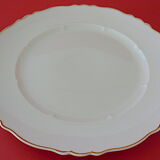Suite of twelve table plates in white porcelain, golden lip