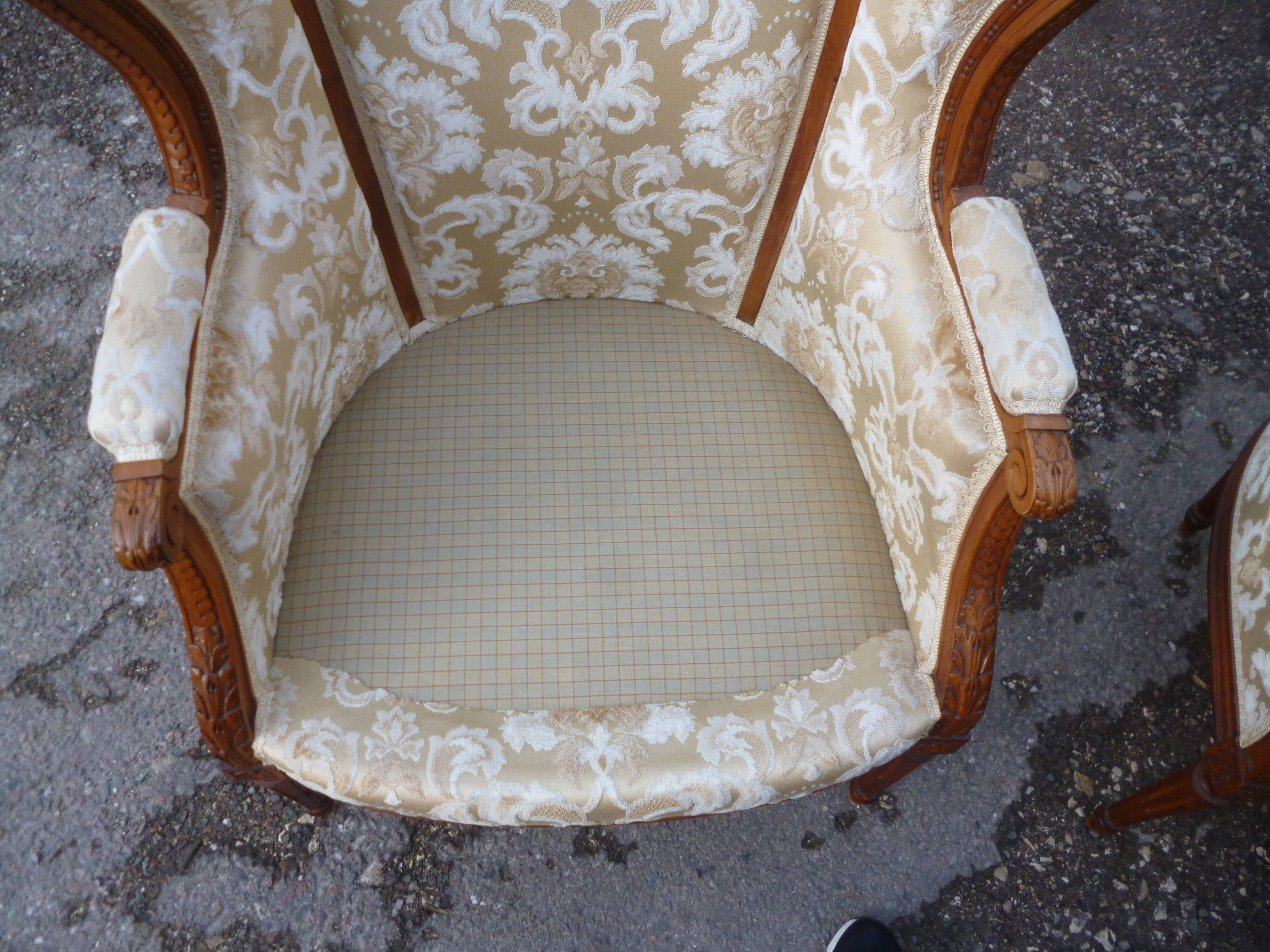 Pair of Louis XVI style armchairs with ears