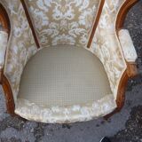 Pair of Louis XVI style armchairs with ears