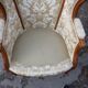 Paire de fauteuils de style Louis XVI à oreilles