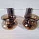 Pair of wall sconces in brass and smoked glass, 1960s.