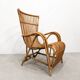 Vintage armchair from the 70s in natural rattan.