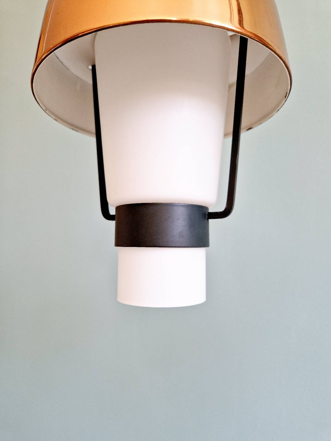 Trio of Scandinavian pendant lights in opaline and copper metal, 1960s