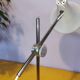 Articulated lamp in white lacquered steel and chrome, 1970.