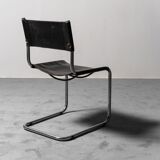 Set of 4 chairs in black leather 70s vintage