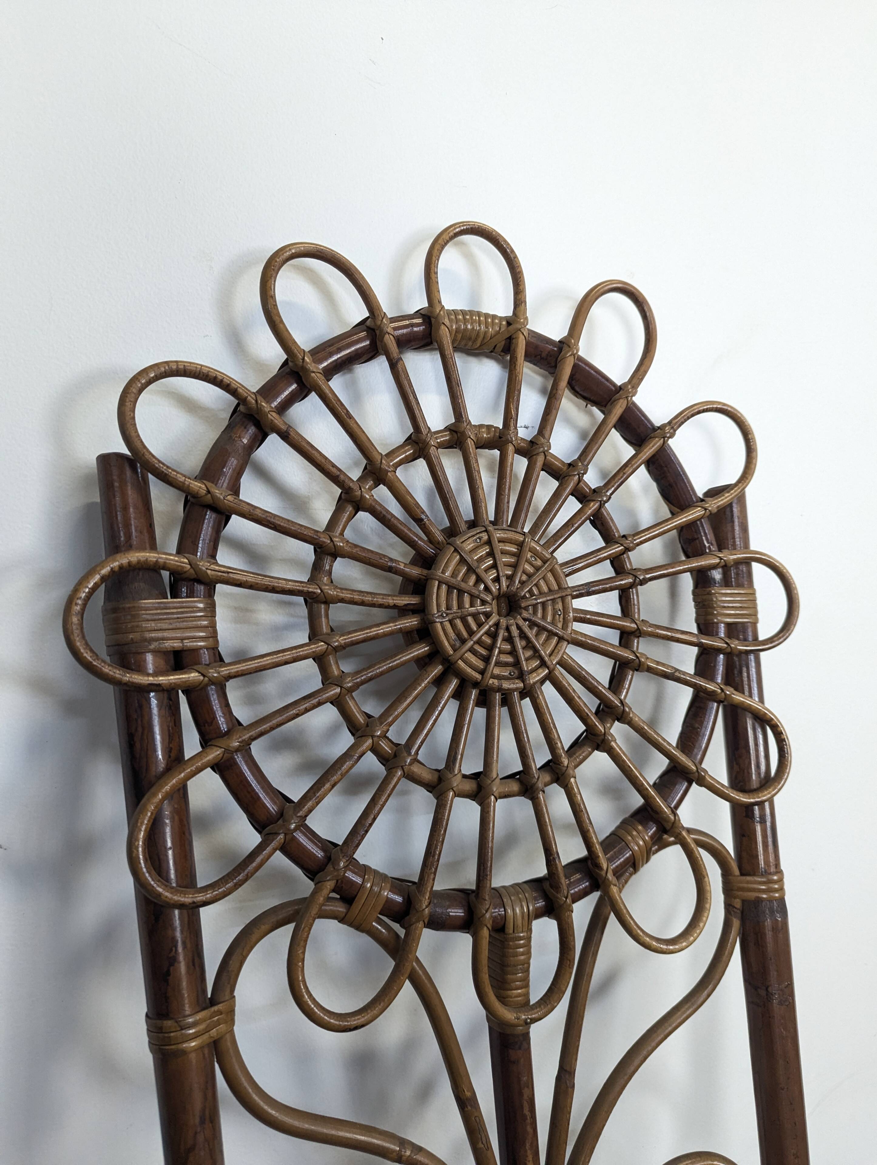 Set of 4 bamboo and rattan chairs with sunflower decoration.