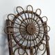 Set of 4 bamboo and rattan chairs with sunflower decoration.