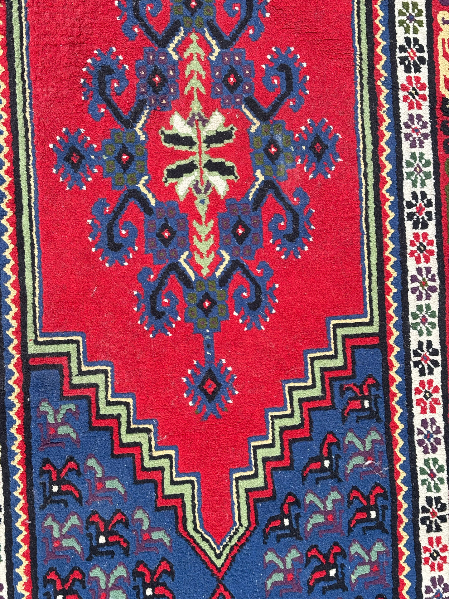 Handwoven wool oriental rug – 220 × 100 cm