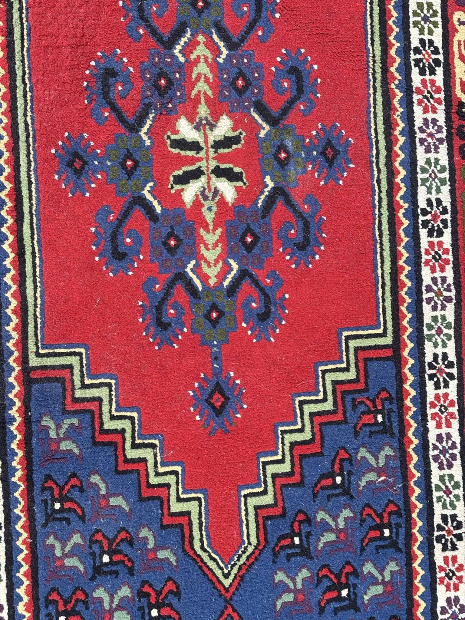 Handwoven wool oriental rug – 220 × 100 cm